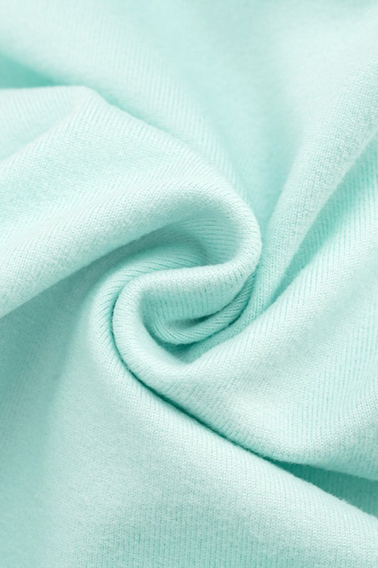 Seitenansicht vom mintfarbenen Crop Top mit Halterneck für Damen