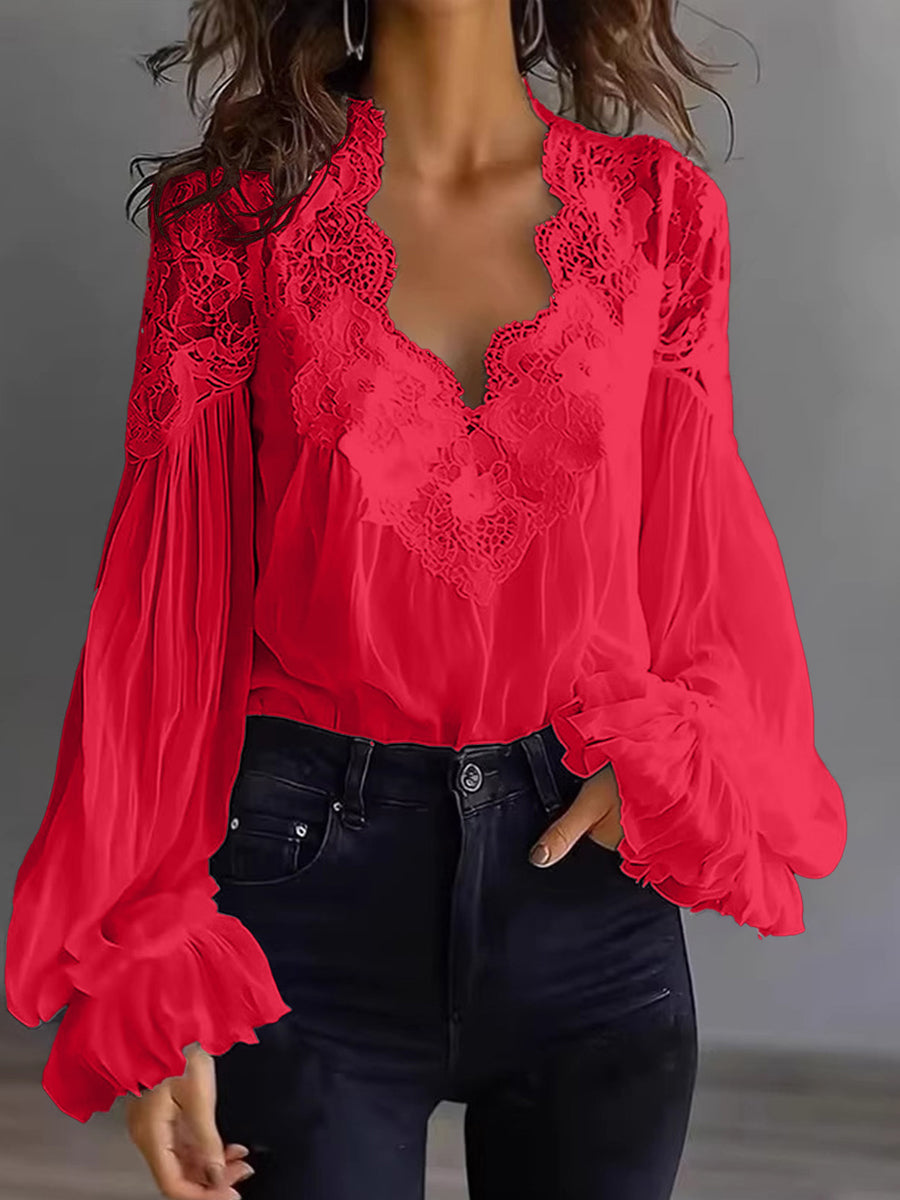 Damenbluse mit Spitzenpatchwork und Puffärmeln