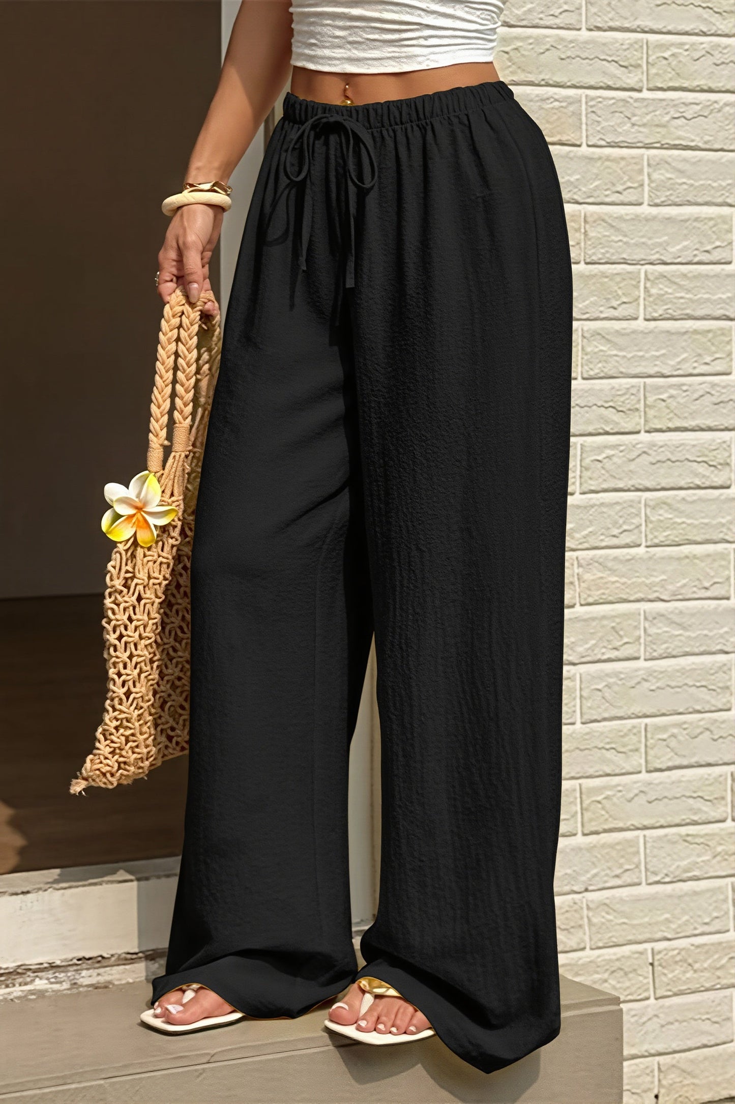 Wide-Leg-Hose für Damen in Uni, Detail vom Bund und Fall
