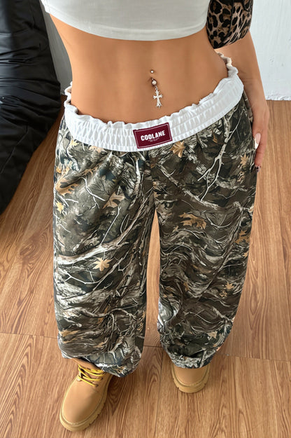 Damen Wide-Leg-Hose mit hohem Bund in Seitenansicht