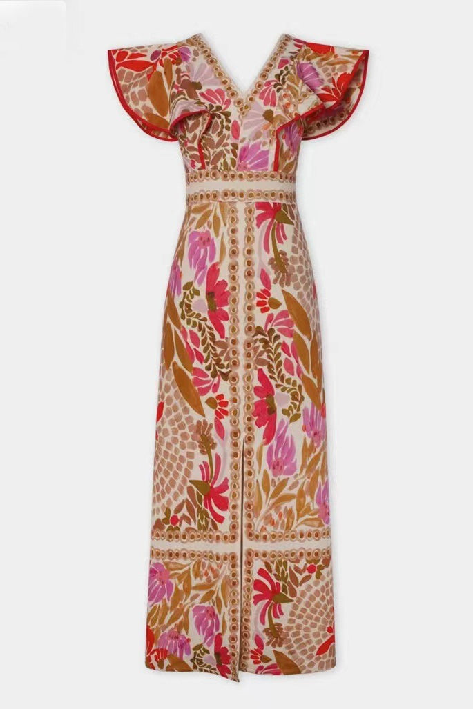 Detailansicht vom Blumenprint und Volantschlitz am Damen-Maxikleid