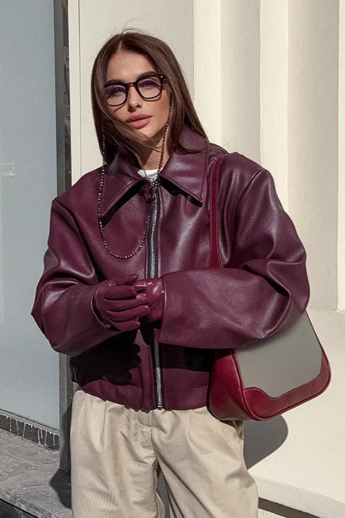 Damen-Bikerjacke aus schwarzem Kunstleder in Cropped-Länge