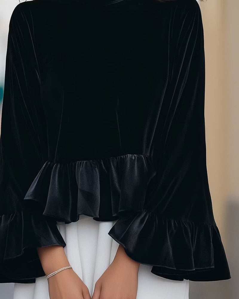 Damenbluse mit Rundhalsausschnitt und weich fallendem Samt