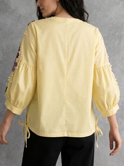 Damen Bluse mit Stickerei, Puffärmeln und seitlichem Schlitz in Gelb