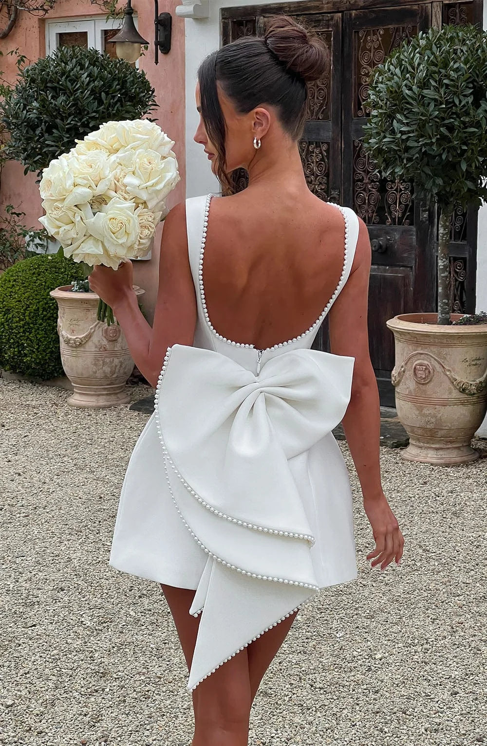 Cocktailkleid für Damen mit Schleifenrücken