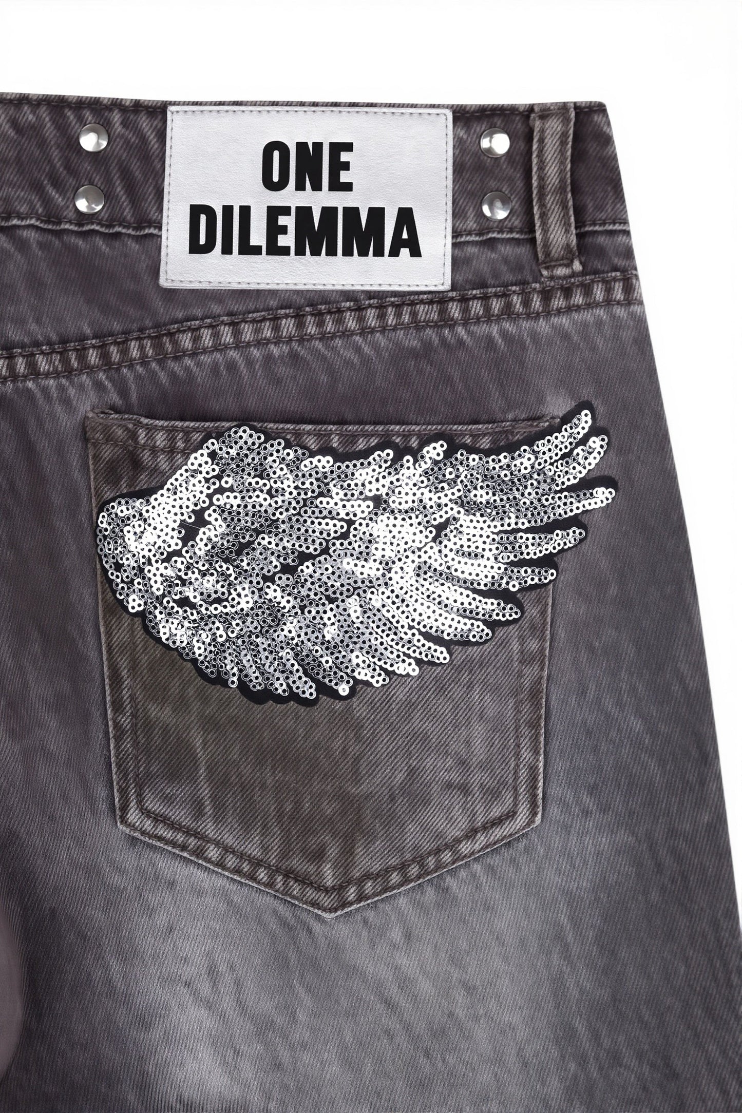 Rückansicht der Damen Wide Leg Jeans mit Patchwork Detail aus Denim