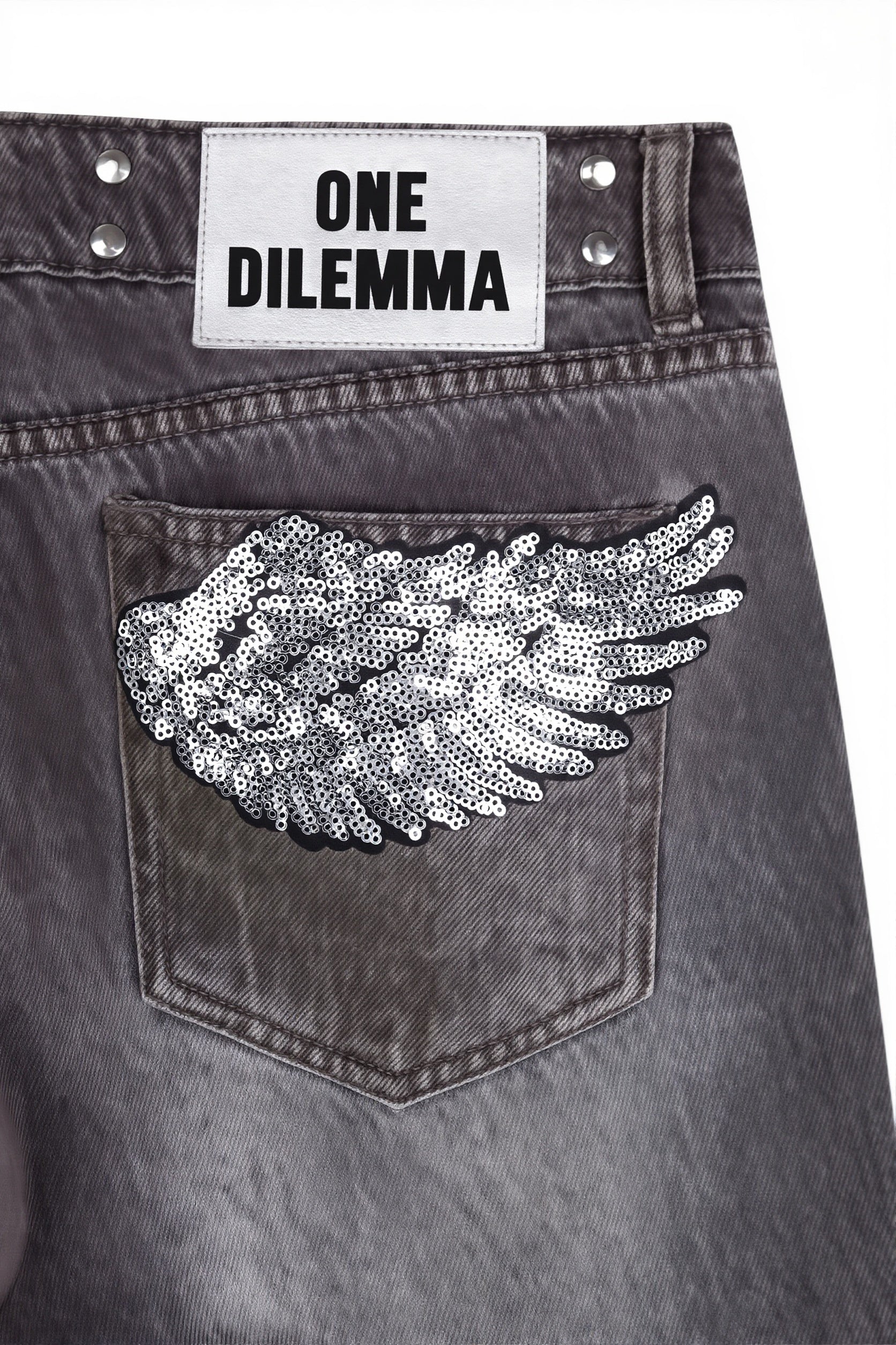 Rückansicht der Damen Wide Leg Jeans mit Patchwork Detail aus Denim