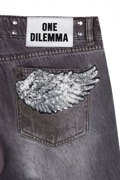 Rückansicht der Damen Wide Leg Jeans mit Patchwork Detail aus Denim