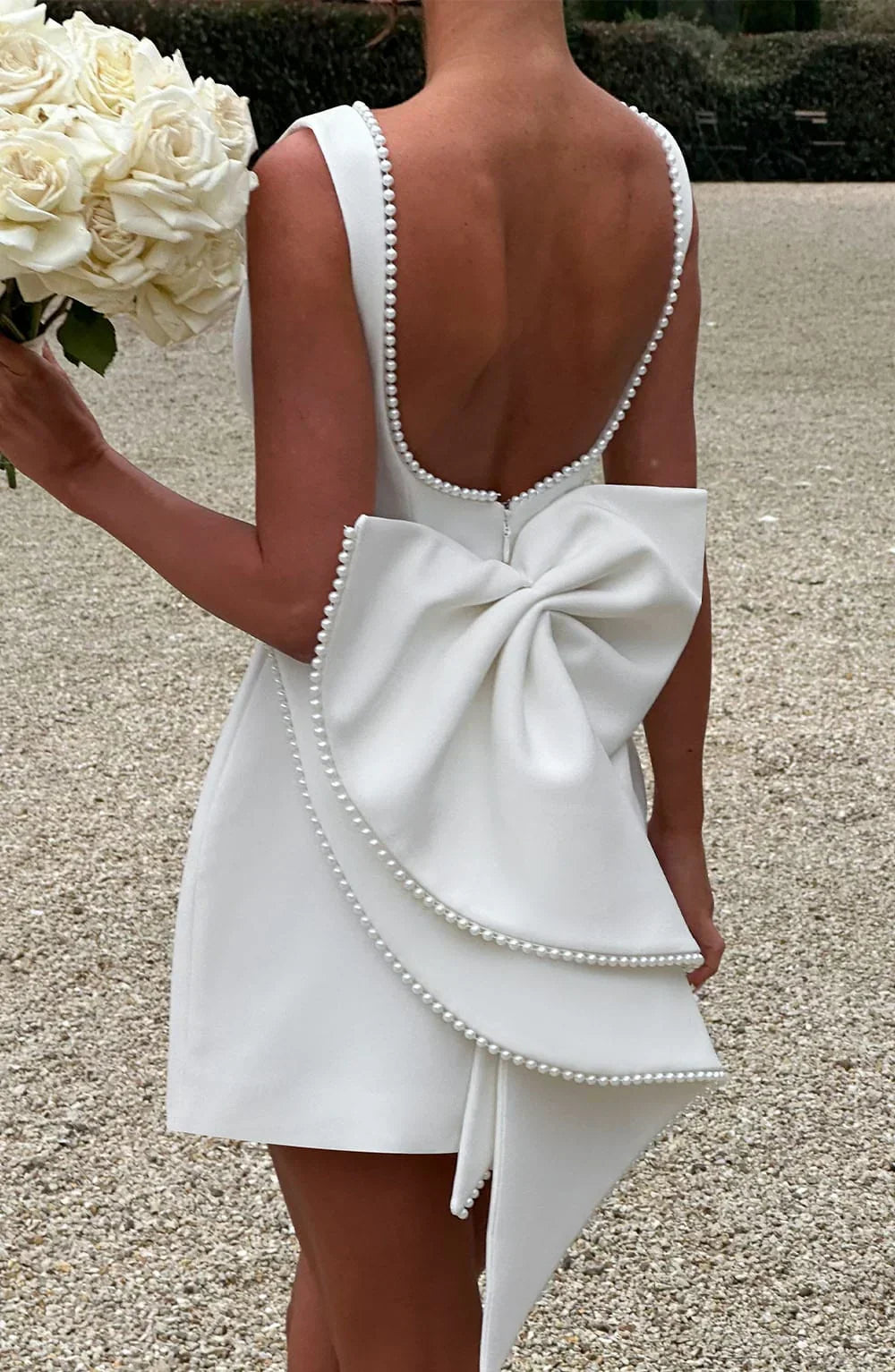 Cocktailkleid für Damen mit Schleifenrücken
