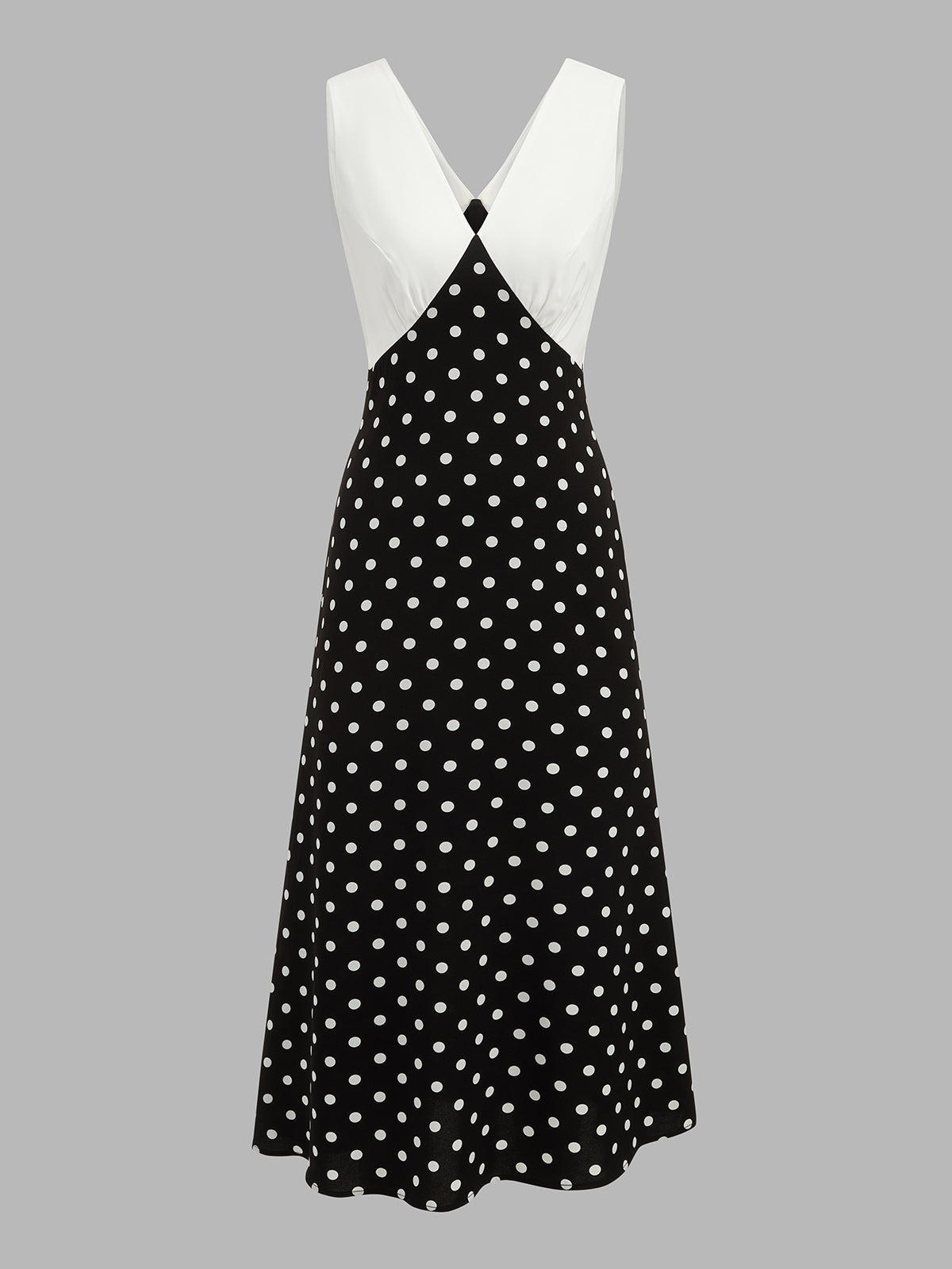 Langes Damenkleid mit Tupfenmuster und farblich abgesetztem Design