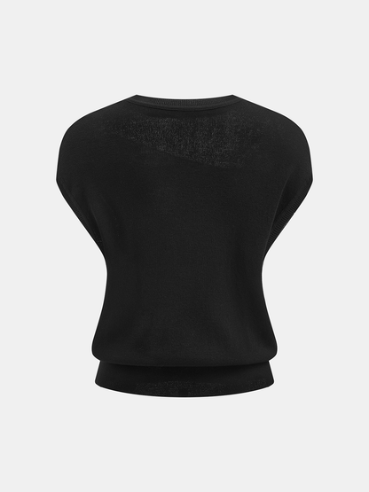 Damen Stricktop in lockerem Schnitt, Seitenansicht am Model