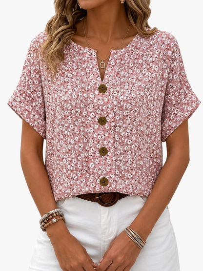 Damenbluse mit Blumenprint und fliessendem Fall in Vorderansicht
