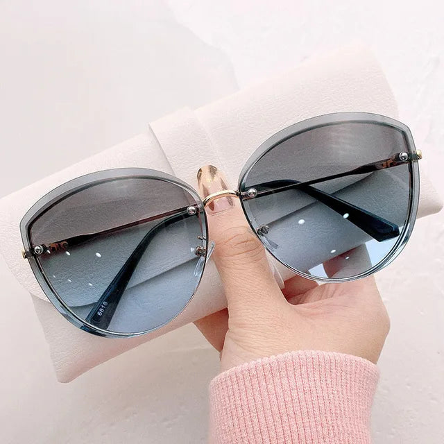 Frauen Randlose Oval Sonnenbrille - UV-Schutz, Polarisierte Gläser