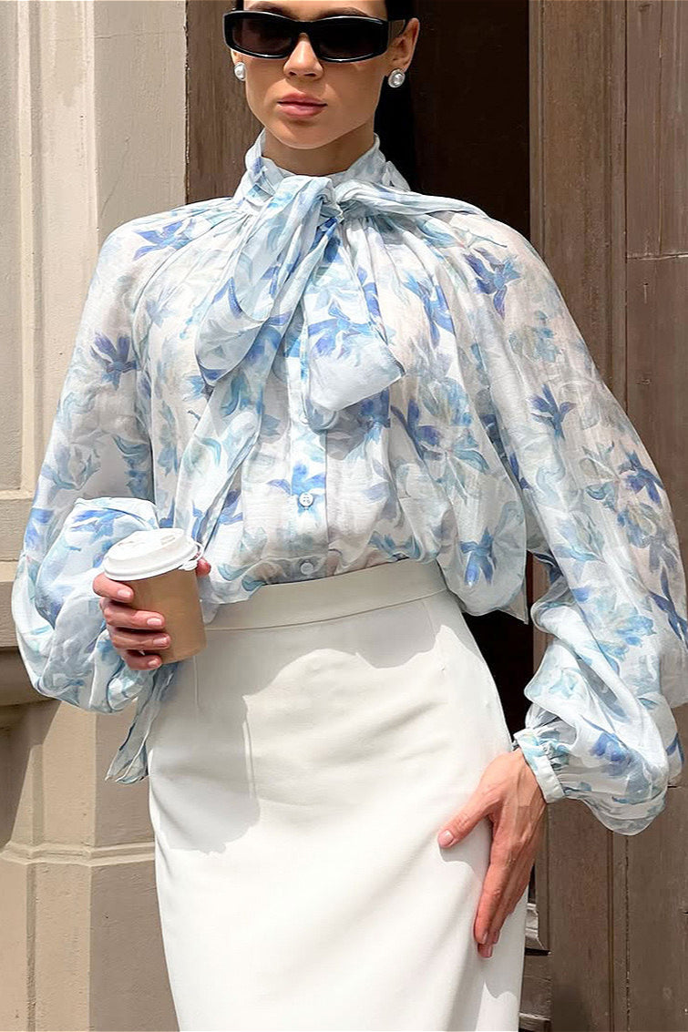 Damenbluse mit Blumenprint und Laternenärmeln in eleganter Ansicht