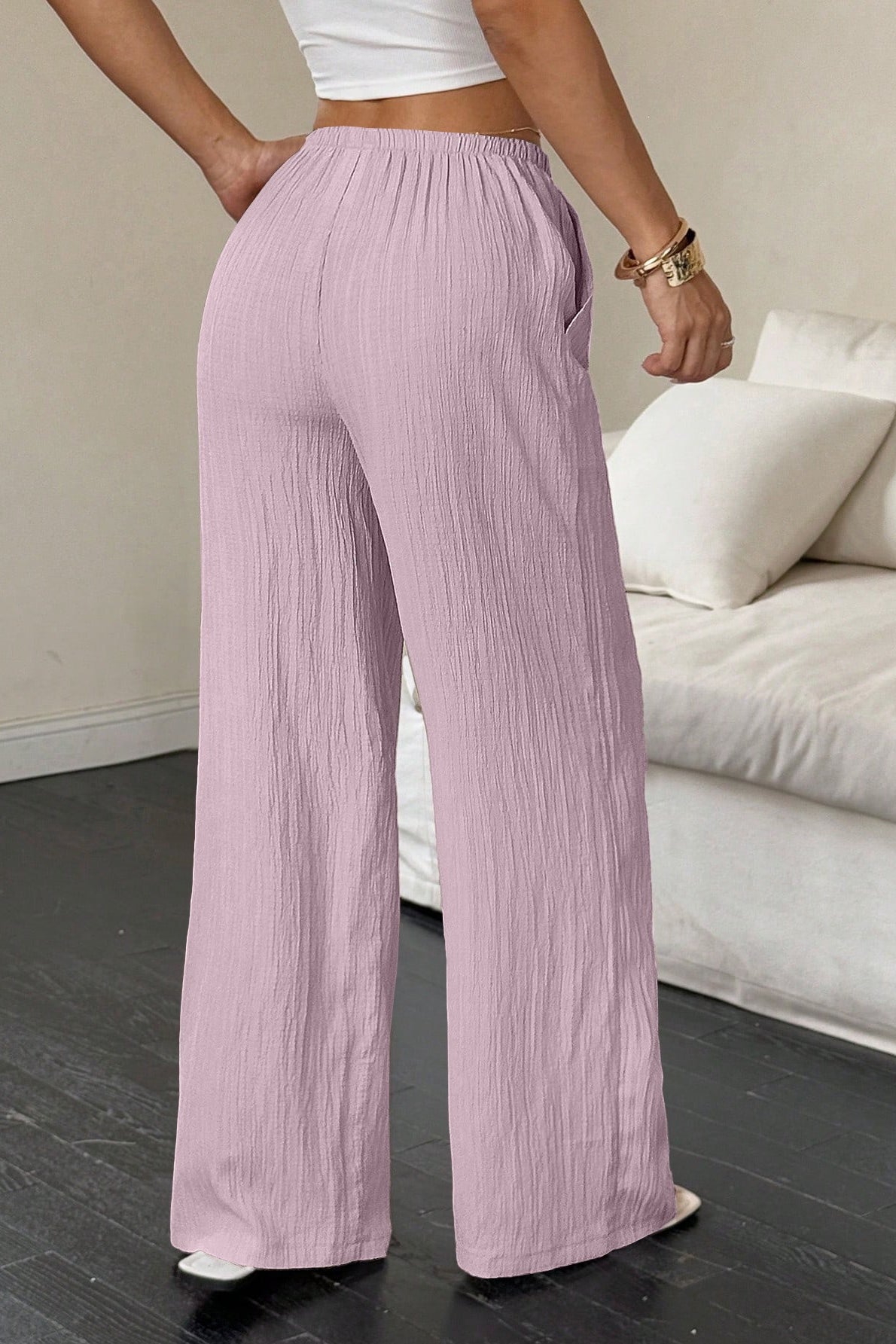 Damen Wide-Leg-Hose mit weitem Bein und Strukturstoff seitlich gezeigt