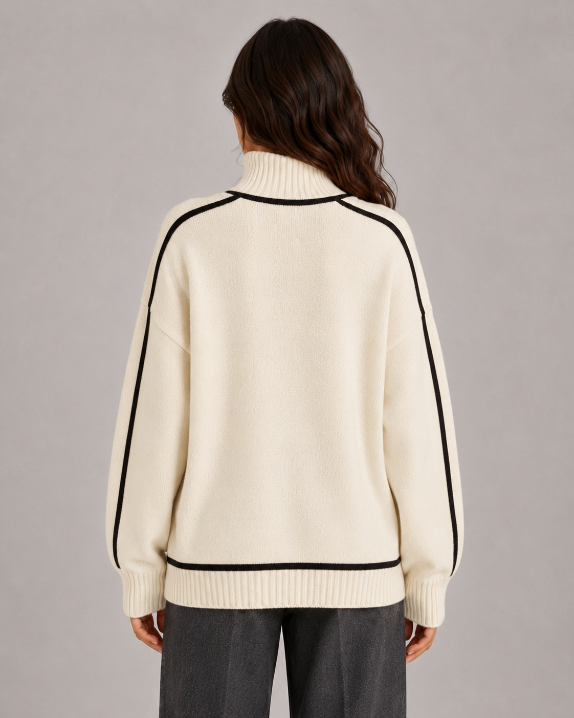 Grob gestrickte Struktur des Oversize-Pullovers aus der Nähe